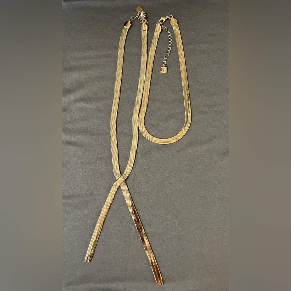 Gold tone omega necklace.